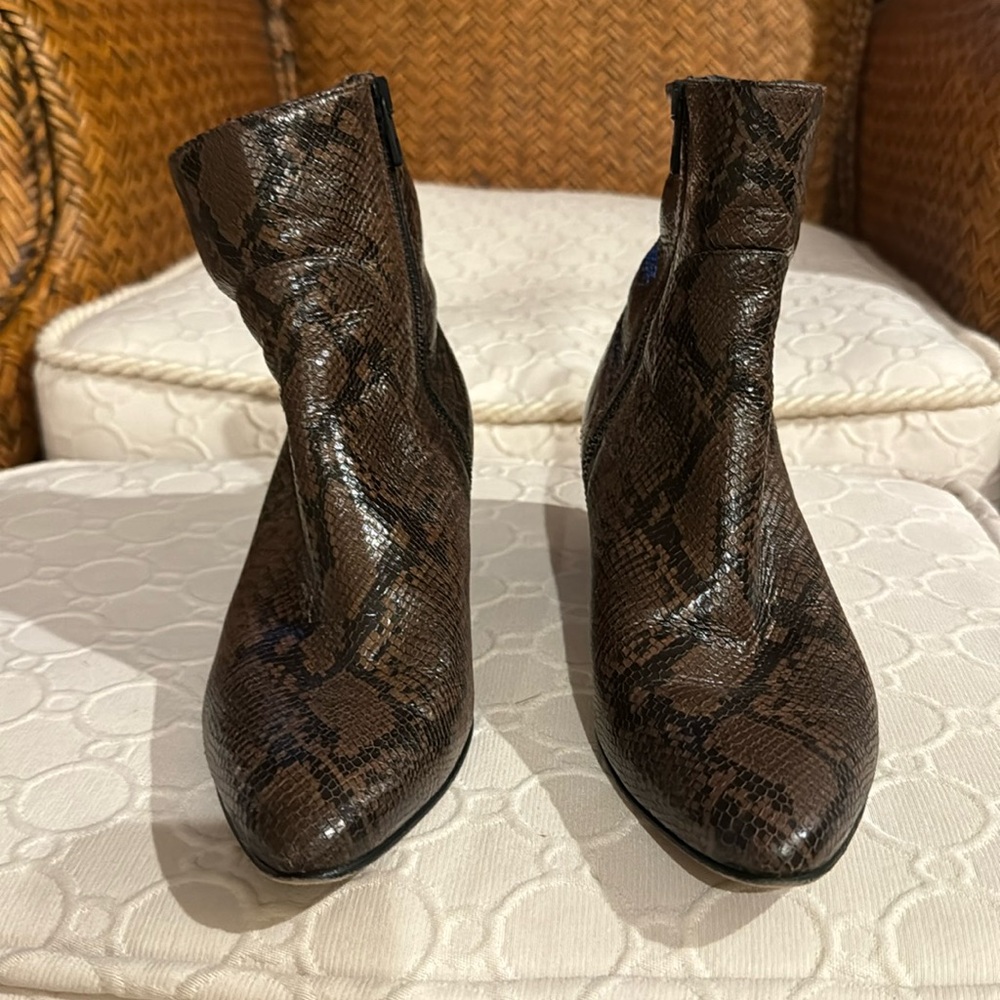 Vince snake print leather calf boots.